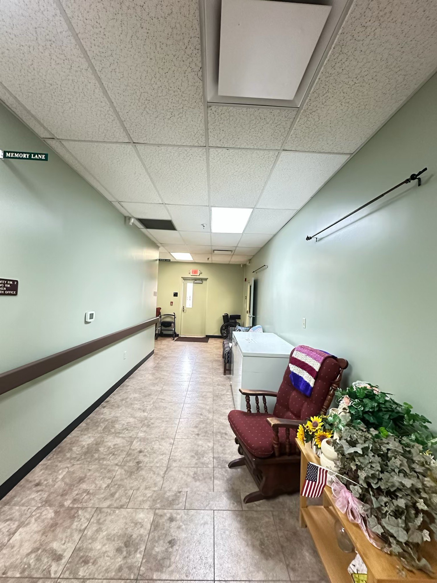 Finished hallway with sage walls